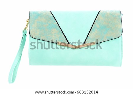 Blue handbag with wrist strap. Leather purse isolated on white background. Fashion concept. Casual female hand bag, close up.