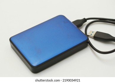 a Blue hard disk isolated on white background. Gadget isolated.