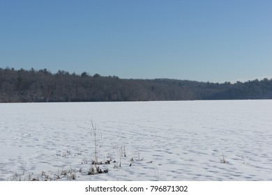 The Blue Hills Reservation's Ponkapoag Pond Frozen In Winter. This Section Is In Canton Massachusetts.