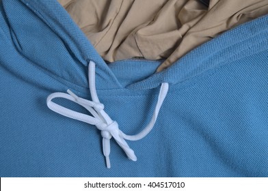 Blue hoodie close up detail. Fashion, Sports and healthy lifestyles