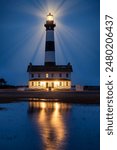 Blue hour reflections of Bodie Island Lighthouse along the North Carolina coast line