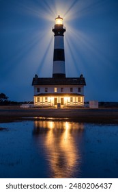 Blue hour reflections of Bodie Island Lighthouse along the North Carolina coast line