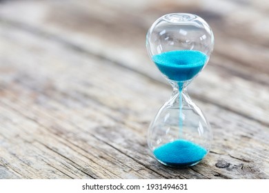 Blue hourglass business background concept for deadline, urgency and countdown - Shutterstock ID 1931494631