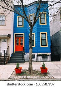 Blue House With Red Door In Bushwick, Brooklyn