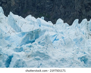 Blue Hues In Glacial Ice Flows And Sea Ice In Alaska, USA.