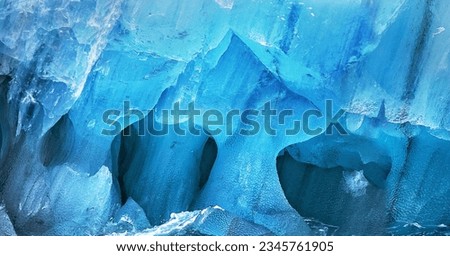 Blue ice on shore; Spitzbergen; Ice scape fantasy; Spitzbergen; Triangles, spikes and curves in ice; Spitzbergen; Wave-washed ice caverns; Spitzbergen