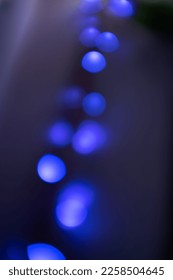 blue indigo bright and glowing circle bokeh light effect on black background - Shutterstock ID 2258504645