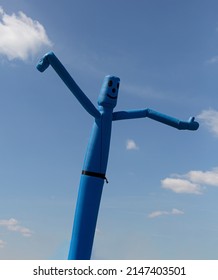 Blue Inflatable Man, Also Called Sky Dancer, Fly Guy, Tall Boy, Tube Man, Or Wacky Waving Inflatable Arm Flailing Tube Man At Market In Mortsel