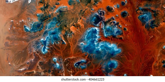 blue islands, landscape after the battle, war, the exterminating angel, abstract photography of the deserts of Africa from the air. aerial view Genre: Abstract Naturalism,