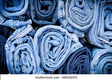 Blue jean background .Blue denim jeans texture. Jeans background. Blue torn denim jeans texture.classic nature tone jean.denim jeans texture background with frayed hole, black fabric grunge background