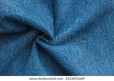 Blue Jeans Background Pattern. Classic twisted denim texture. Creases of jeans texture with Copy space.