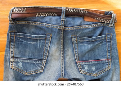 mens jeans with designs on back pockets