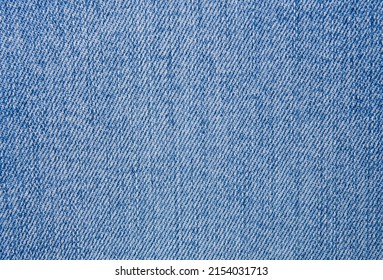 Blue jeans fabric. Denim jeans texture or denim jeans background
				
				