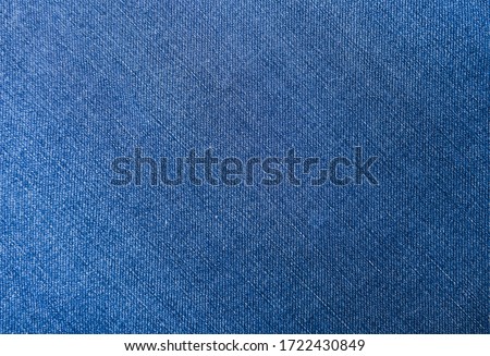 Blue jeans fabric denim texture background. 


