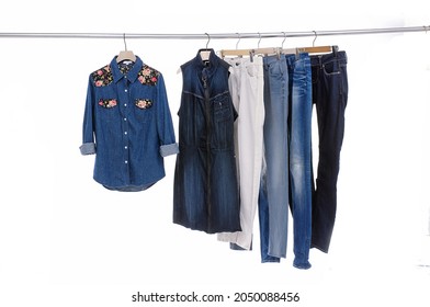 Blue Jeans With Khaki Pants With Woman Jeans Shirt, Dress Jeans On Hanger 