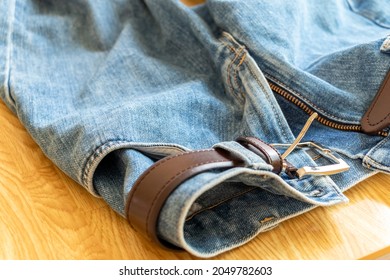 Blue Jeans With Leather Belt