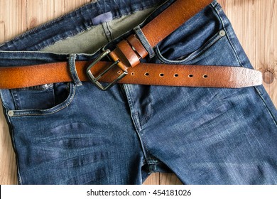 Blue jeans with leather belt