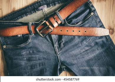 Blue jeans with leather belt vintage color