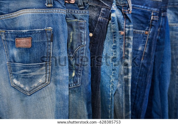 Blue Jeans Pants Clothes Pile Background Stock Photo (Edit Now) 628385753