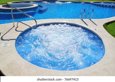 Blue Jet Spa Pool In Green Grass Garden Outdoor Day