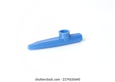 Blue Kazoo, Kazoo Isolated On A White Background. Wind Instrument Idea Concept. A Small Plastic Musical Instrument For Children. Copy Space, Nobody, No People. Music Education