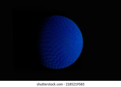 Blue Kickball Dodgeball Sports Ball Inflatable Textured Grip Generic Athletic Rubber Gym Ball With Weave Texture. Wall Ball Used For Common Recreational Sports Games And Gym Class. Dark Lighting. 