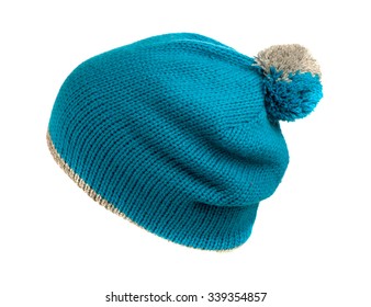  Blue Knitted Beanie With Pompom  Isolated On White Background .