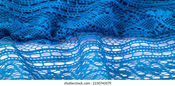 Blue knitted lace triangular scarf, shawl, autumn winter scarf, hood, wedding accessories Project ideas, designer fashion accessor. texture, backgroun