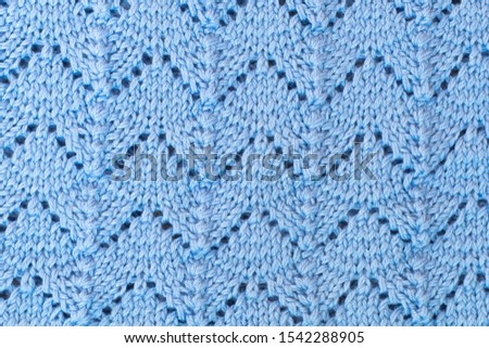 Blue knitted wool background, texture