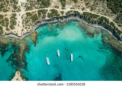 Blue lagoon and boats - Shutterstock ID 1185554218