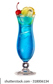 Blue Lagoon cocktail with a slice of lemon and cherry isolated on white
