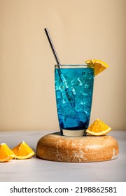 Blue Lagoon mojito-A mocktail drink which is soda and blue in colour served with ice cubes and fresh orange slices to give a slight tanginess. - Shutterstock ID 2198862581