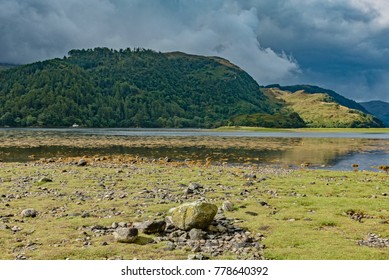 Blue Lagoon With Rocky Mountains In England Scotland