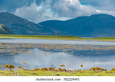 Blue Lagoon With Rocky Mountains In England Scotland