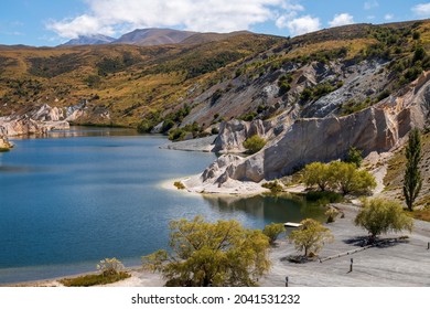 The Blue Lake, St Bathans In The Heart Of The Maniototo, Otago. Once Part Of Otago Gold Rush, It Is Now A Tranquil Holiday Retreat. 