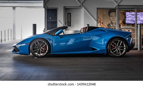 Blue Lamborghini Huracan Spyder
parked in a parking garage with the top down in Las Vegas, Nevada / USA - July 1st, 2019