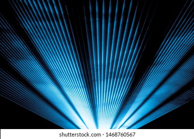 Blue Laser Show Nightlife Club Stage And Shining Sparkling Rays. Luxury Entertainment In Nightclub Event, Festival, Concert Or New Years Eve. Ray Beams Are Symbol For Science And Universe Research