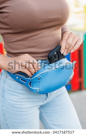 Blue leather women's belt bag. a bag of bananas for every day.