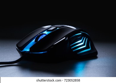 Blue light computer gaming mouse in dark tone