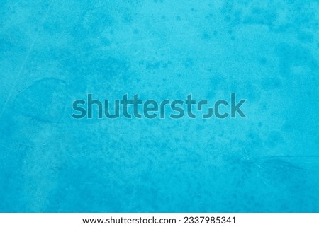 Blue light concrete texture for background in summer wallpaper. Cyan cement colour sand wall of tone vintage. Abstract teal dark color. Cement grain texture paint watercolor for design decoration.