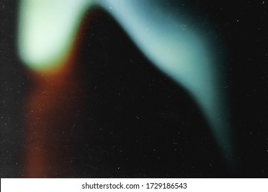 Blue light effect on black background. Retro image. Cool vintage film photography effect. Analog foto. Grunge frame. redaction. 80s