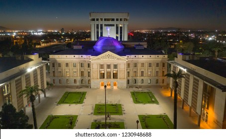 Blue light illuminates the roof of the Arizona Capitol building in Phoenix USA