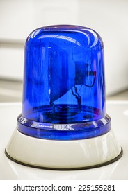 Blue Light At An Old Police Car