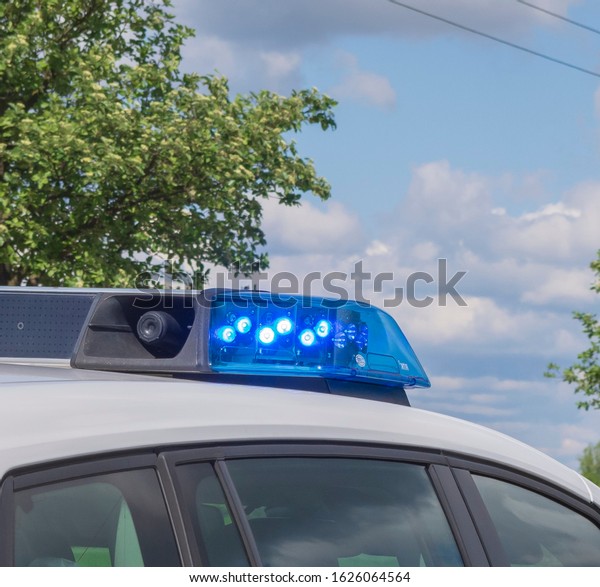 Blue light on a police\
car