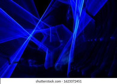 Blue Light Painting Photography, Long Exposure Fairy Lights Against A Black Background