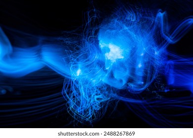 Blue Light wave of energy explosion with elegant glowing lines. Abstract technology background. High quality photo