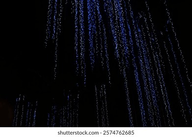 Blue lights abstract pattern background which look like digital binary bits streaming