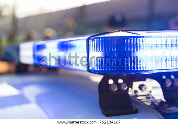 blue lights of police\
cars