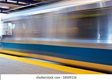 Blue Line Subway Train Arrives At The Airport Depot