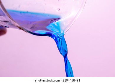 Blue Liquid Poured In The Laboratory